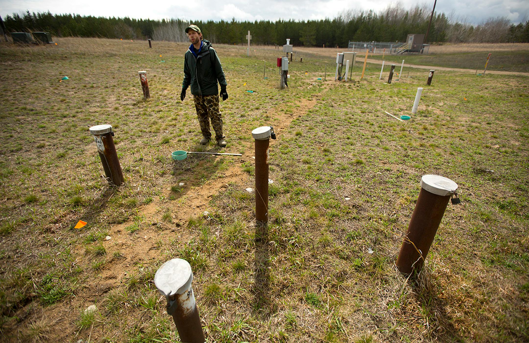 As Enbridge Energy plans another crude oil pipeline through northern Minnesota bog lands, state environmental officials are worried about the risk of another spill in sensitive natural areas. At the site of 1979 spill near Bemidji, scientists have dotted the landscape with bore holes to study of the lingering underground pollution. Here, US Geological Survey hydrologist Jared Trost stands among the many bore holes near the 1979 pipeline rupture. ] BRIAN PETERSON • brian.peterson@startribune.com
