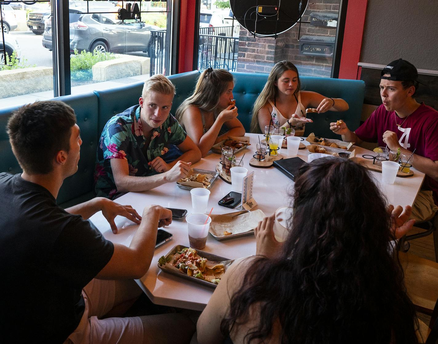 A group of Minnesota State University, Mankato students enjoyed time at The 507 in Mankato. Clockwise from left is Josh Hamond, 21, Jake West, 22, Bailey Higgins, 23, Kara Winters, 21, AJ Wilson, 21, and Elva Colman, 22. ] LEILA NAVIDI • leila.navidi@startribune.com BACKGROUND INFORMATION: The 507 in Mankato on Wednesday, July 8, 2020. Bars are the new nursing homes - emerging coronavirus hotspots that are contributing to the spread of the virus in Minnesota and across the country.