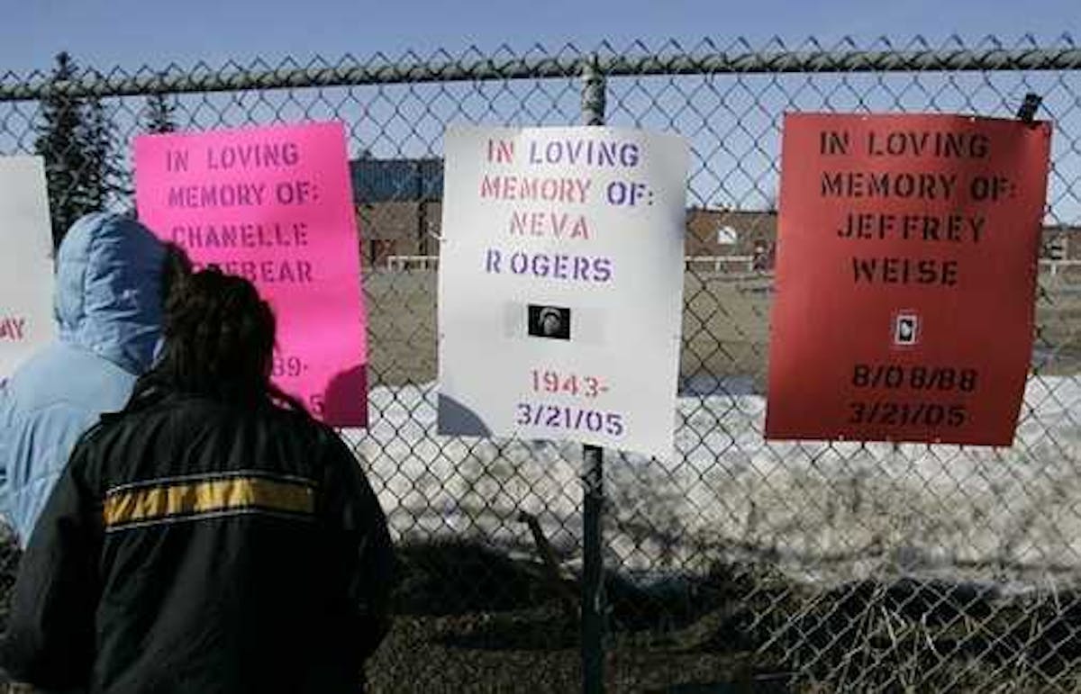 2007 Photo: Posted signs of condolences for Red Lake victims, included one for the shooter, Jeffrey Weise, on the far right.