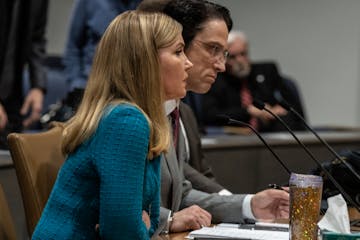 Democratic Sen. Nicole Mitchell, left, was seated next to her attorney Bruce Ringstrom Jr. during the Minnesota Senate ethics hearing Tuesday in St. P