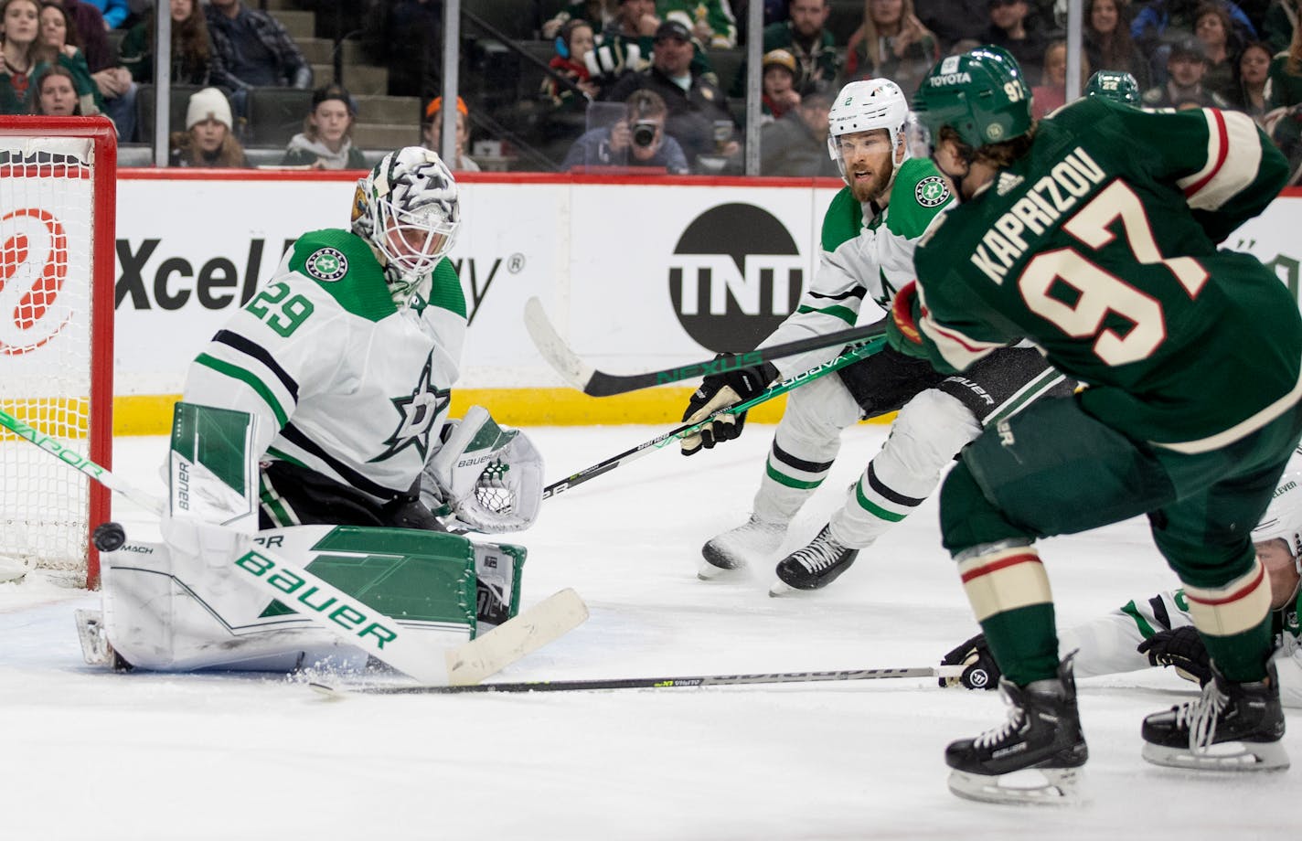 Kirill Kaprizov (97) of the Minnesota Wild gets the puck past Dallas Stars goalie Jake Oettinger (29) for a goal in the third period Sunday, March 6, at Xcel Energy Center in St. Paul, Minn. ] CARLOS GONZALEZ • cgonzalez@startribune.com