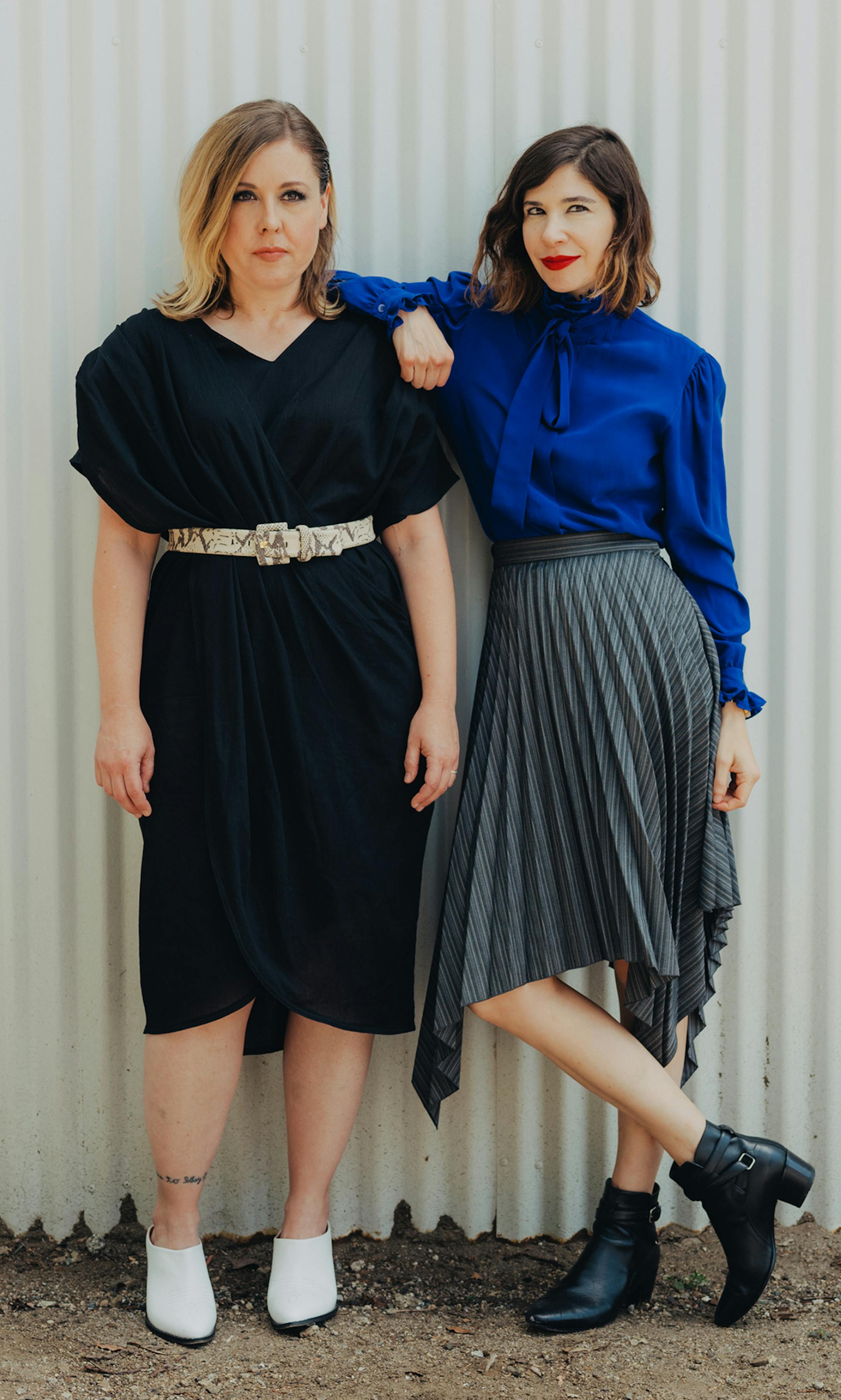 Corin Tucker, left, and Carrie Brownstein of Sleater Kinney, in Los Angeles, July 9, 2019. After two and a half decades, the acclaimed band collaborates with St. Vincent for its ninth album -- and moves onward without its longtime drummer. (Rozette Rago/The New York Times)