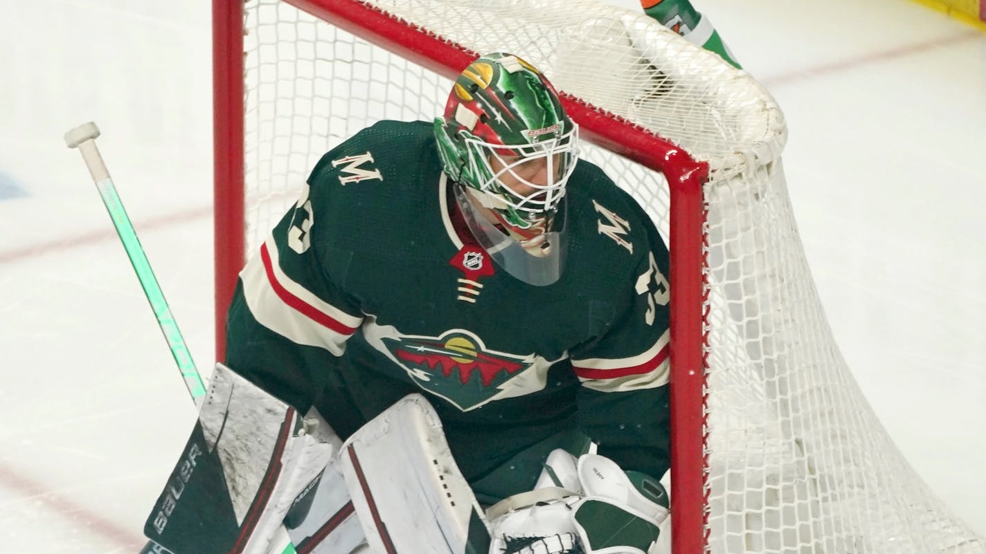 Minnesota Wild goalie Cam Talbot (33) defends the net in an NHL hockey game against the Edmonton Oilers, Tuesday, April 12, 2022, in St. Paul, Minn. (AP Photo/Jim Mone)