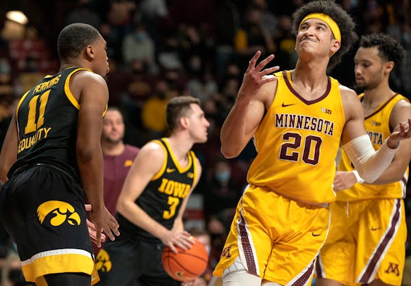 Gophers guard E.J. Stephens (20) reacted after missing a shot against Iowa on Jan. 16.