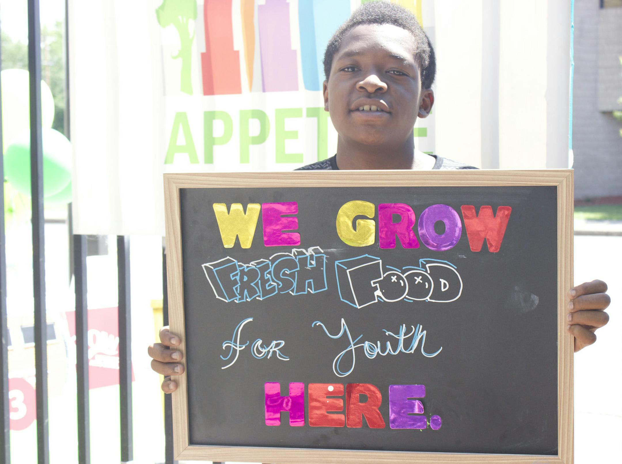 Youth involved in Appetite for Change encourage north Minneapolis residents to shop fresh.