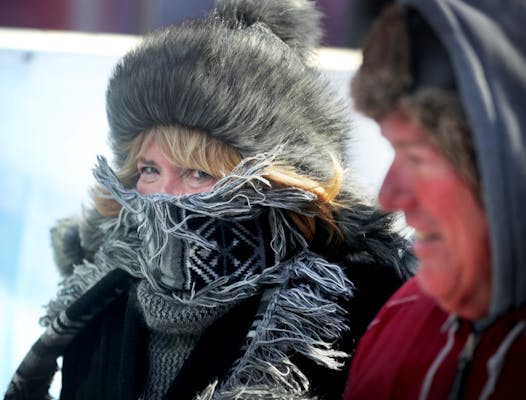 Husband and wife Scott and Jill Lutgens of Burnsville were dressed for a stroll in the cold last February.