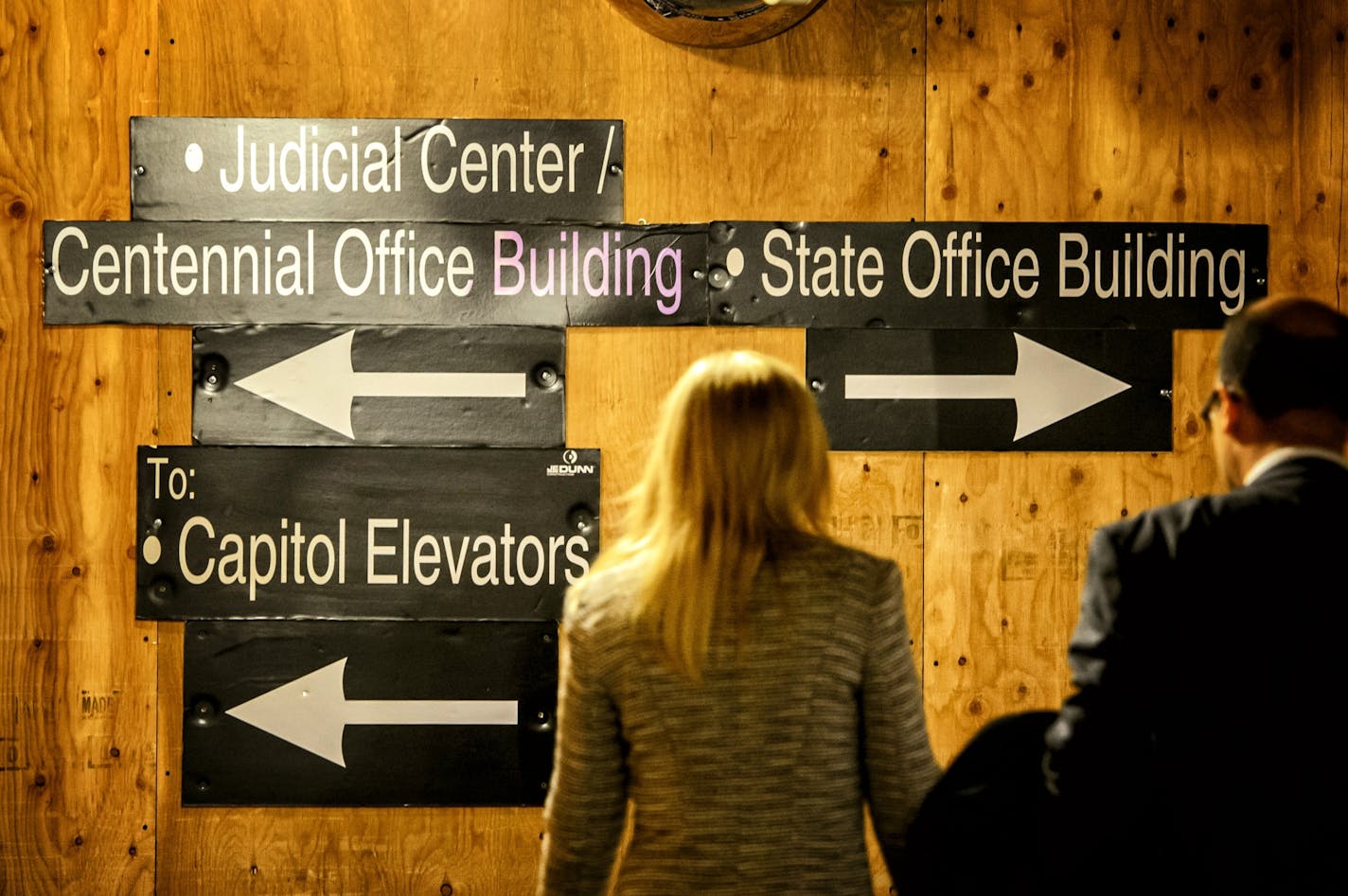 Signs in the State Capitol basement point visitors in the right direction amid a huge reconstruction project.