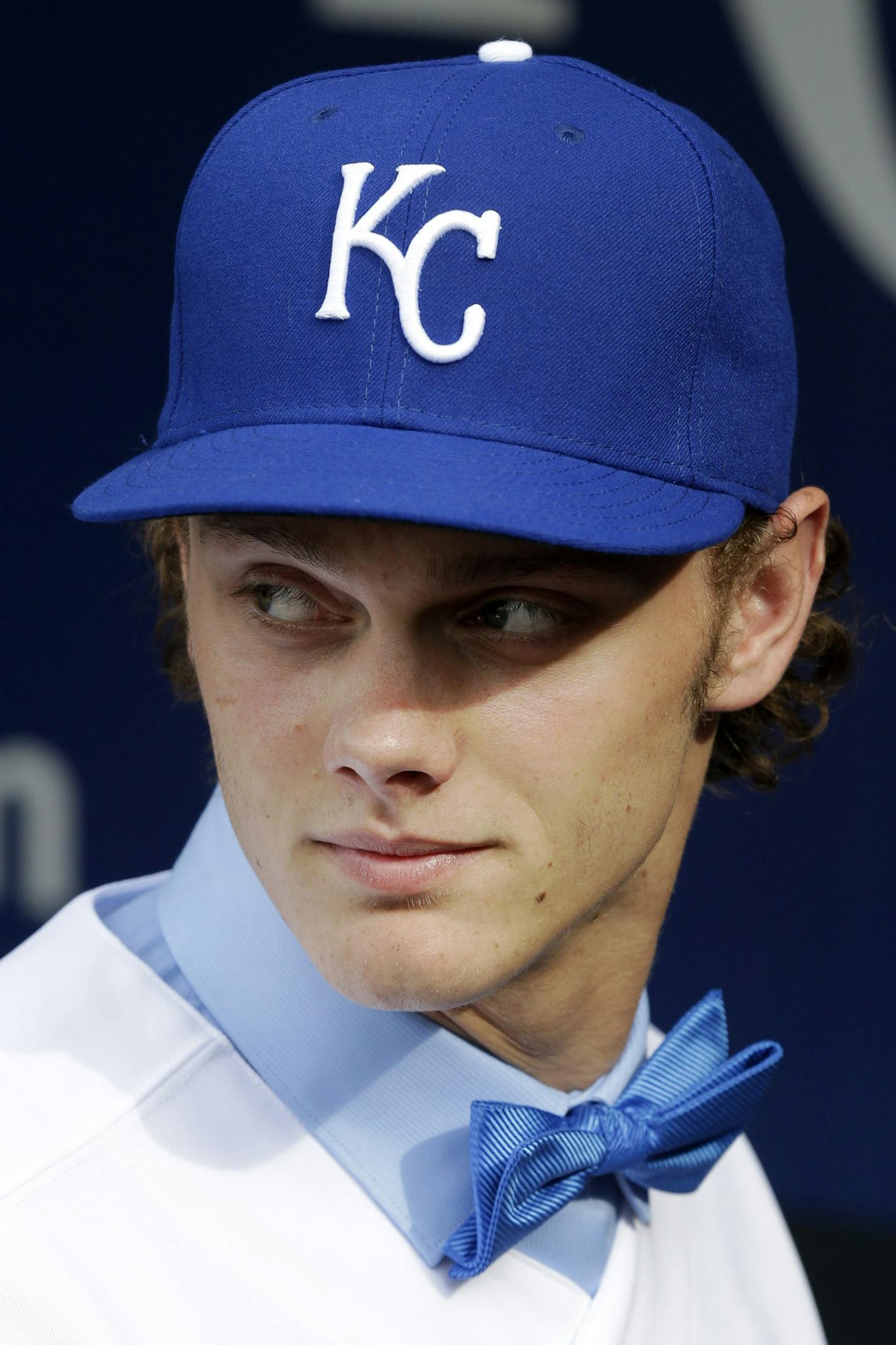 Kansas City Royals first -ound draft pick Ashe Russell looks over the facilities before a baseball game between the Royals and the Milwaukee Brewers at Kauffman Stadium in Kansas City, Mo., Wednesday, June 17, 2015. Russell is a right-handed pitcher from Cathedral High School in Indianapolis. (AP Photo/Orlin Wagner) ORG XMIT: MIN2015061917522081