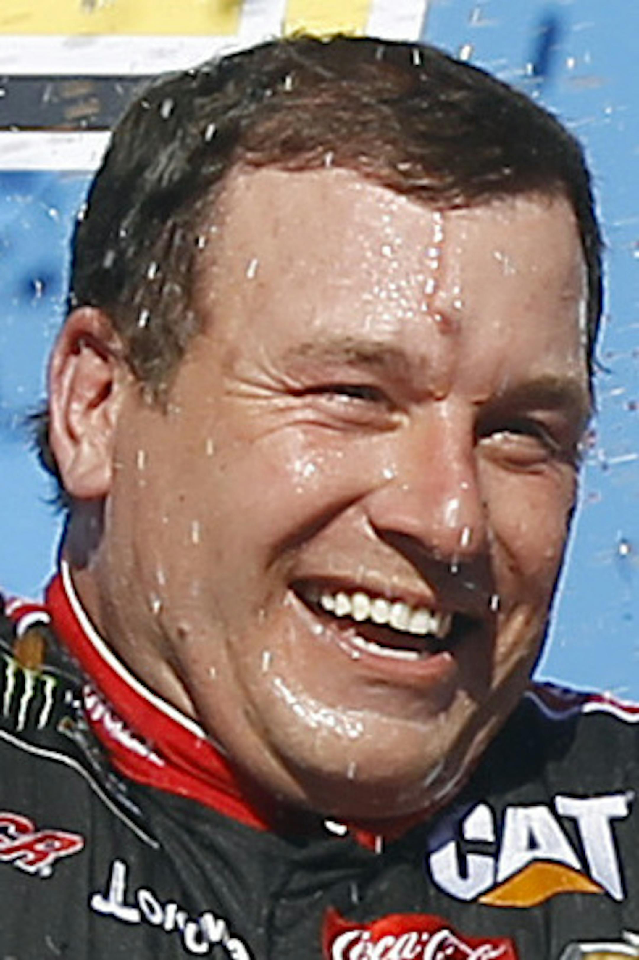 Ryan Newman celebrates in Victory Lane after winning the NASCAR Cup Series auto race at Phoenix International Raceway, Sunday, March 19, 2017, in Avondale, Ariz. (AP Photo/Ralph Freso)
