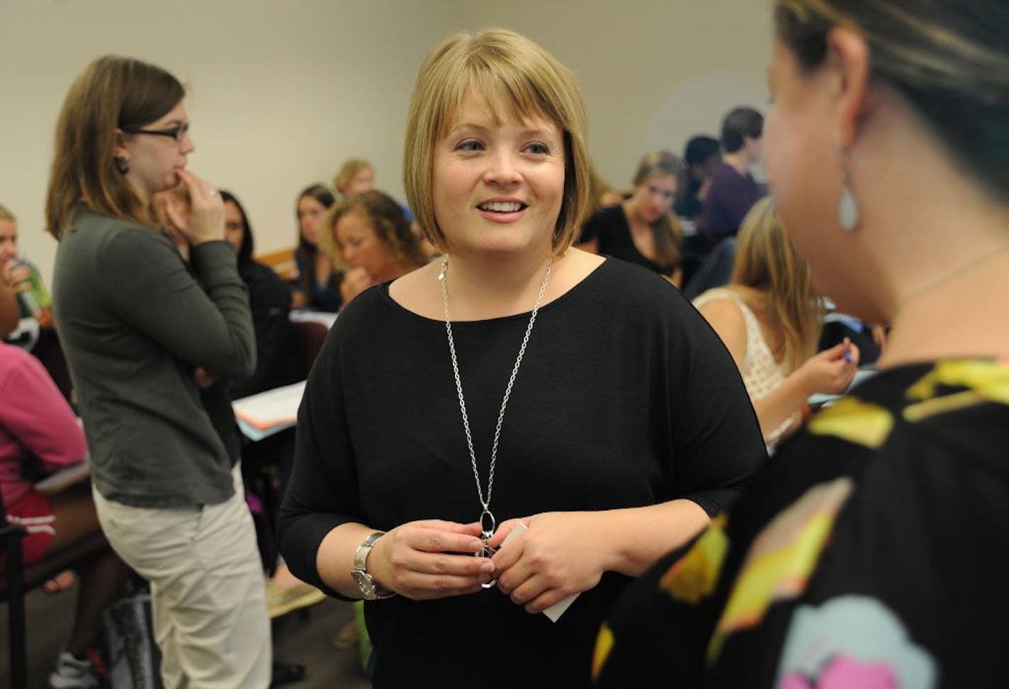 Susan Thomas, who is the principal city planner for the city of Minnetonka, talked to graduate students from the University of Minnesota who are moving their studies this year from the classroom to City Hall.