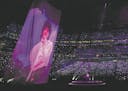Accompanied by a huge projection of Prince, Justin Timberlake played the piano and sang during the halftime show at Super Bowl LII at U.S. Bank Stadiu