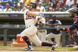 Minnesota Twins' Logan Forsythe bats against the Cleveland Indians in the eighth inning of a baseball game Wednesday, Aug. 1, 2018, in Minneapolis. Th