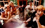 July 15, 1993 Barbara Carlson, morning talk show host (ess) os KSTP Talk radio does her thing in her hot tub at her home with women from HOOTERS, the 