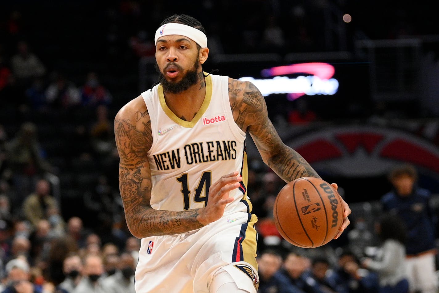 New Orleans Pelicans forward Brandon Ingram (14) in action during the first half of an NBA basketball game against the Washington Wizards, Monday, Nov. 15, 2021, in Washington. (AP Photo/Nick Wass)