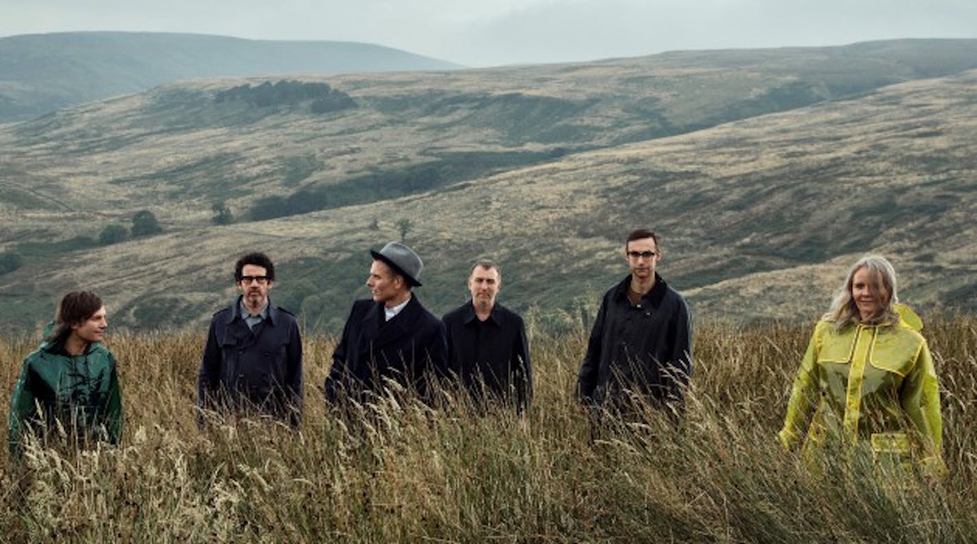 Belle & Sebastian's drummer Richard Colburn, third from right, had to be saved from a landscape much like this one by frontman Stuart Murdoch, third from left. / Courtesy Matador Records