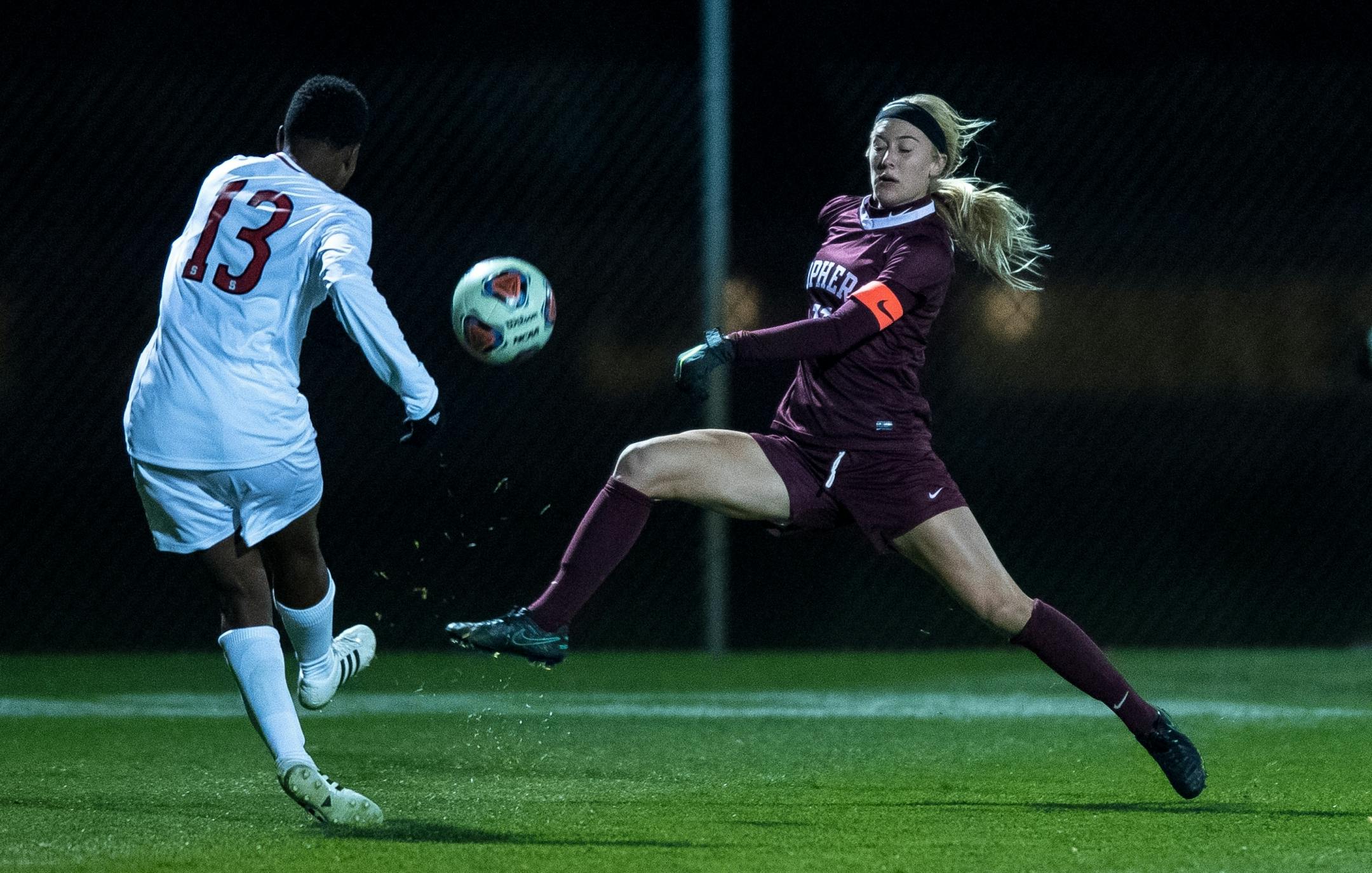 Minnesota midfielder Josee Stiever (11) unsuccessfully tried to control the ball as NC State defender Ella Bonner (13) kicked it away to midfield in OT.