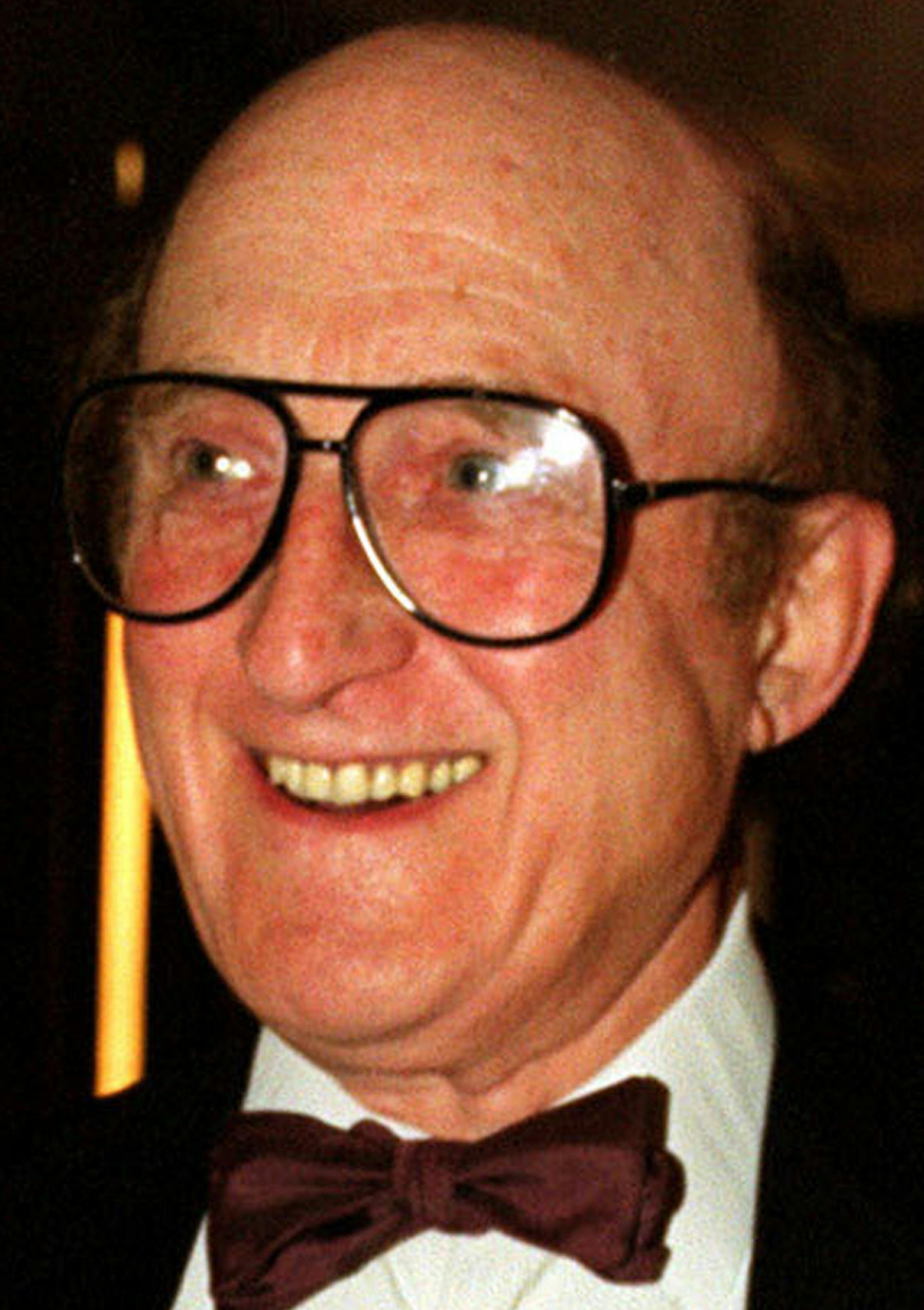 FILE - A Sept. 9, 1999 photo from files of British actor Ron Moody, attending an event in London. Ron Moody, best known for playing Fagin in the 1968 film “Oliver!”, has died aged 91. His agent said Moody, who received an Oscar nomination for best actor for his performance in the Charles Dickens adaptation, died in hospital Thursday, June 11, 2015. (Michael Crabtree/PA via AP) UNITED KINGDOM OUT NO SALES NO ARCHIVE