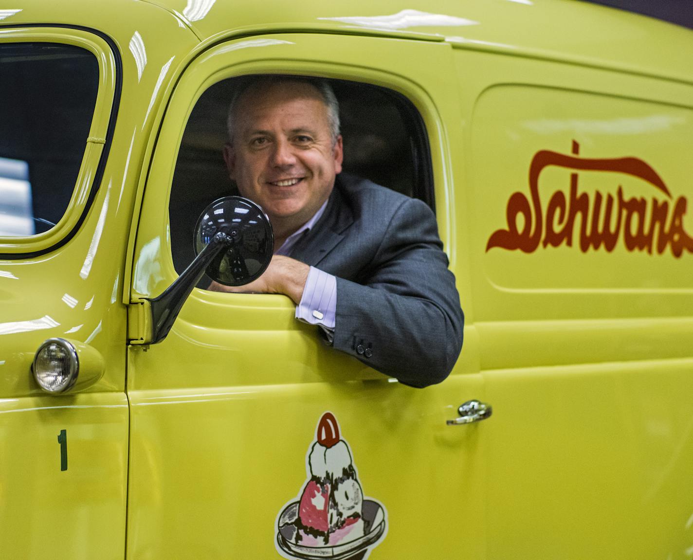 Schwan's is considering strategic alternatives, according to a CNBC report. The Marshall company's bright yellow delivery trucks (CEO Dimitrios Smyrnios is sitting in one) have been well known for years. (RICHARD TSONG-TAATARII/Star Tribune file photo)