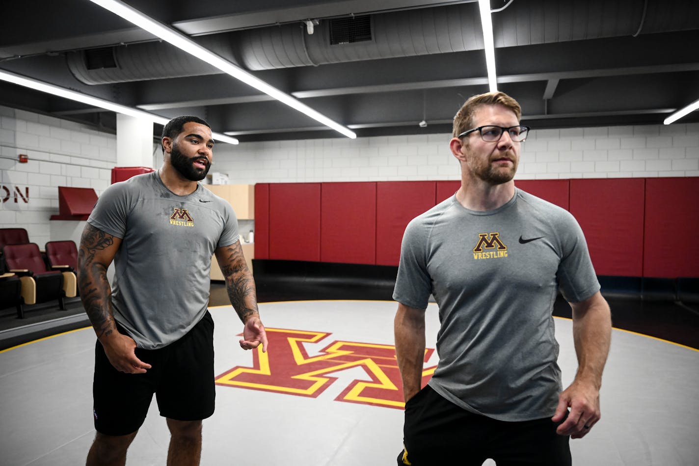 Gophers wrestler Gable Steveson spoke with head coach Brandon Eggum during Thursday's workout.