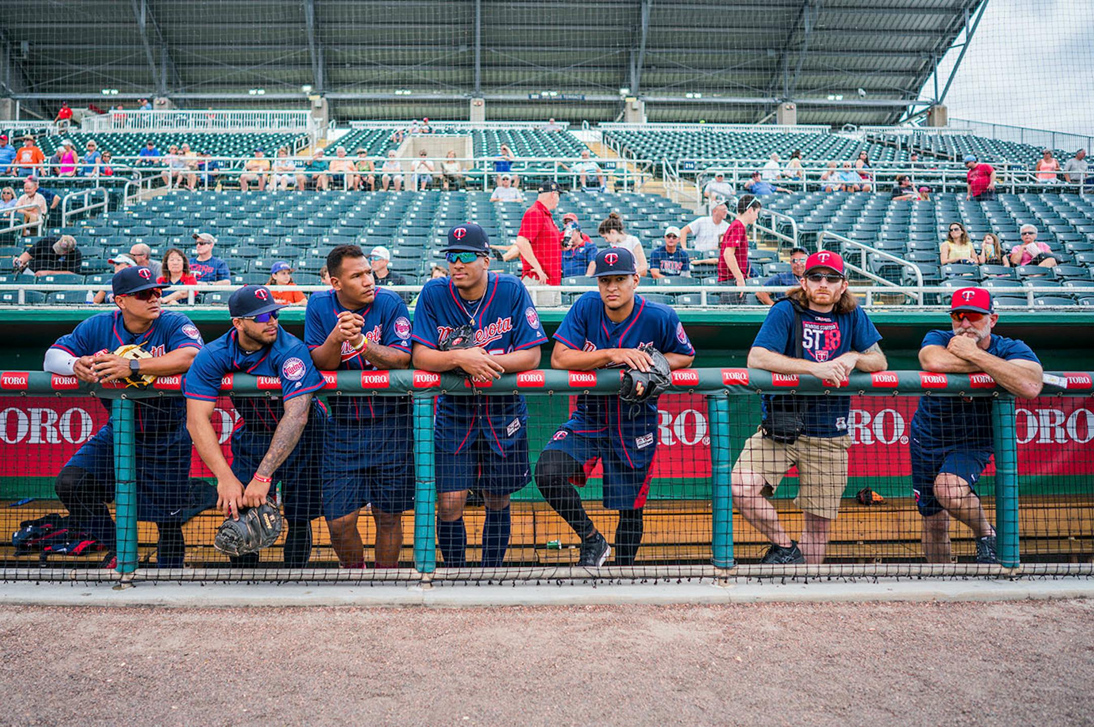 Minor league players prepared to take the field for the Twins' open house.