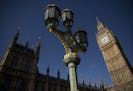 An exterior view shows the Houses of Parliament and Elizabeth Tower, which houses the Big Ben bell in London, Tuesday, April 26, 2016. Officials say t