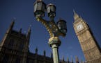 An exterior view shows the Houses of Parliament and Elizabeth Tower, which houses the Big Ben bell in London, Tuesday, April 26, 2016. Officials say t