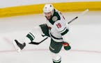 Minnesota Wild's Luke Kunin (19) celebrates a goal against the Vancouver Canucks during the first period of an NHL hockey playoff game Tuesday, Aug. 4