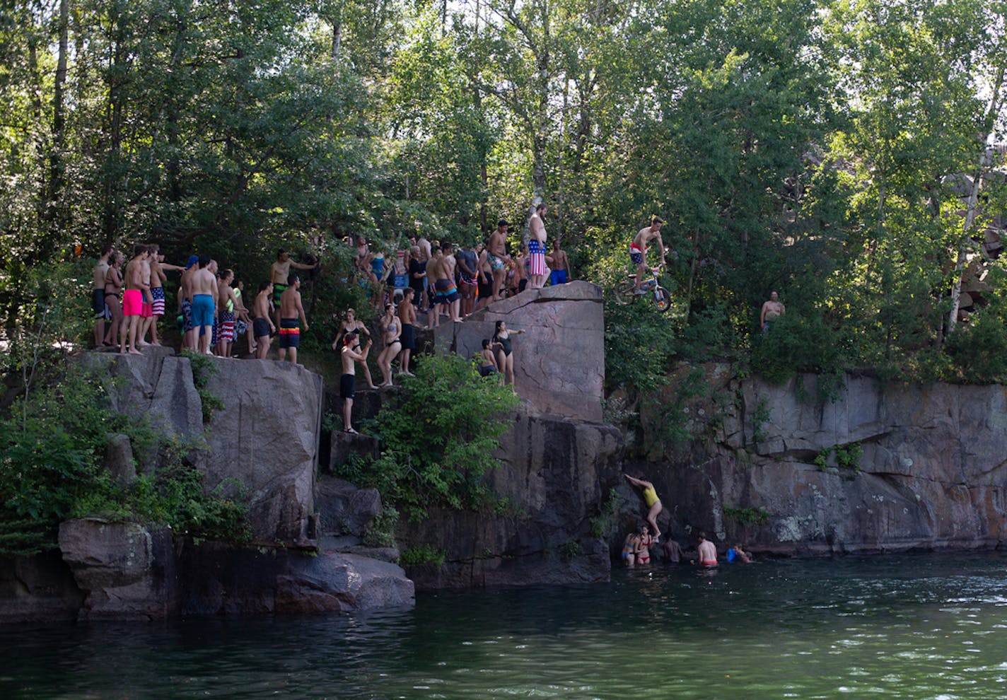 Quarry Park attracts an estimated 150,000 visitors per year, with most coming from Memorial Day through Labor Day. Nicer days in the summer draw many hundreds to its two swimming quarries. Water in one quarry is more than 100 feet deep, making it especially popular with cliff jumpers. ALEX KORMANN ¥ alex.kormann@startribune.com