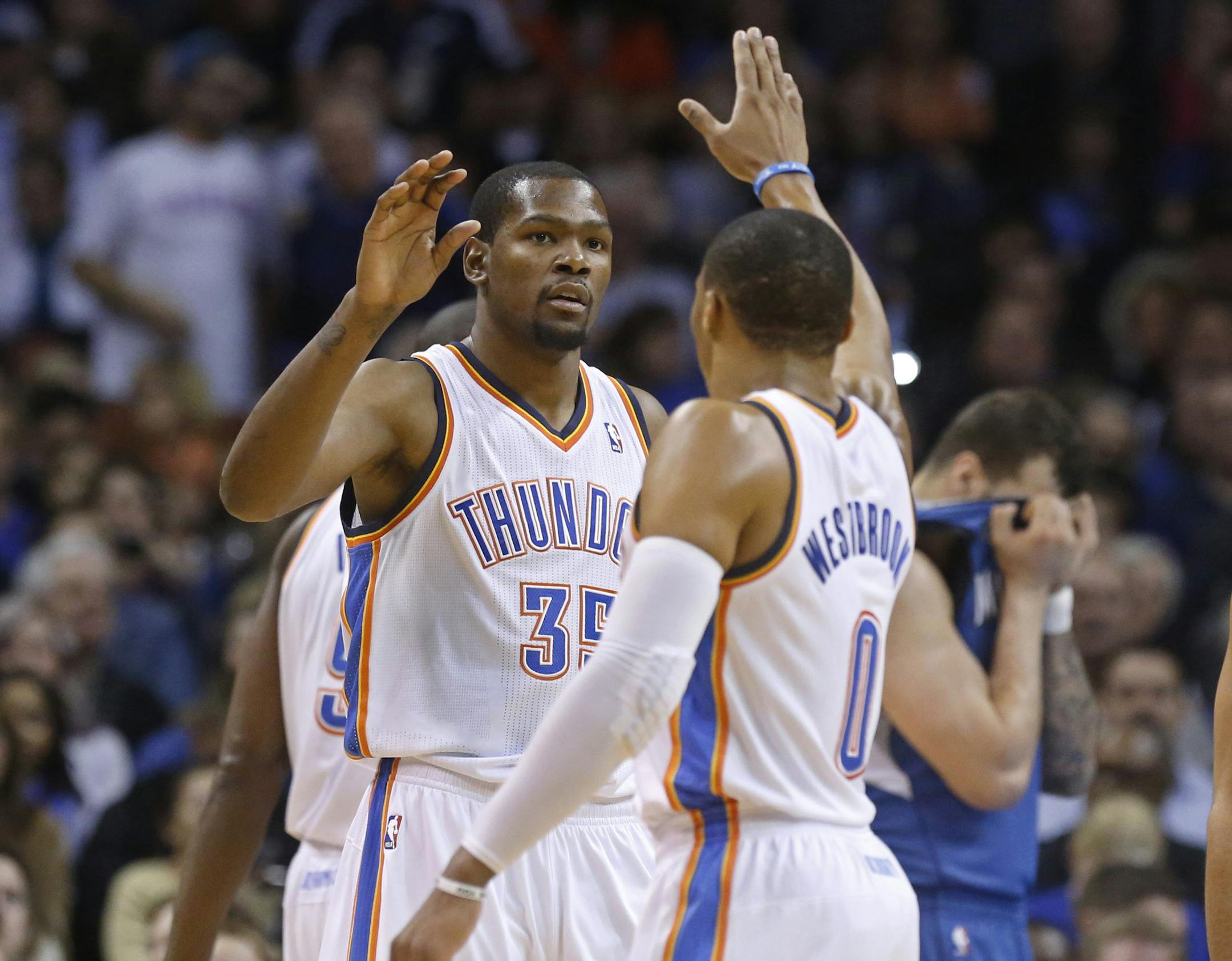 Oklahoma City Thunder forward Kevin Durant (35) and guard Russell Westbrook (0)
