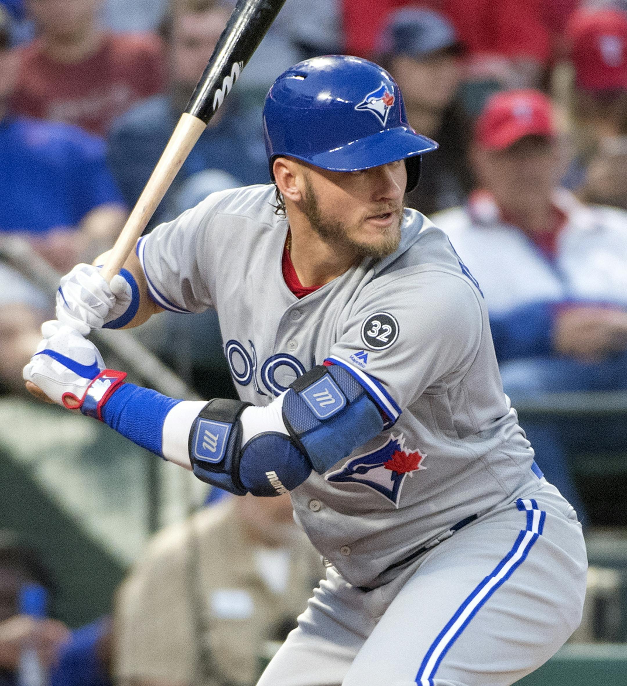 Toronto Blue Jays' Josh Donaldson prepares to swing at a pitch from Texas Rangers starting pitcher Matt Moore in the first inning of a baseball game, Friday, April 6, 2018, in Arlington, Texas. Toronto won 8-5. (AP Photo/Jeffrey McWhorter)