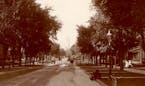 Wide boulevards, an asphalt street and mansions set apart Park Avenue in this 1905 photo, taken from Franklin Avenue looking northward.