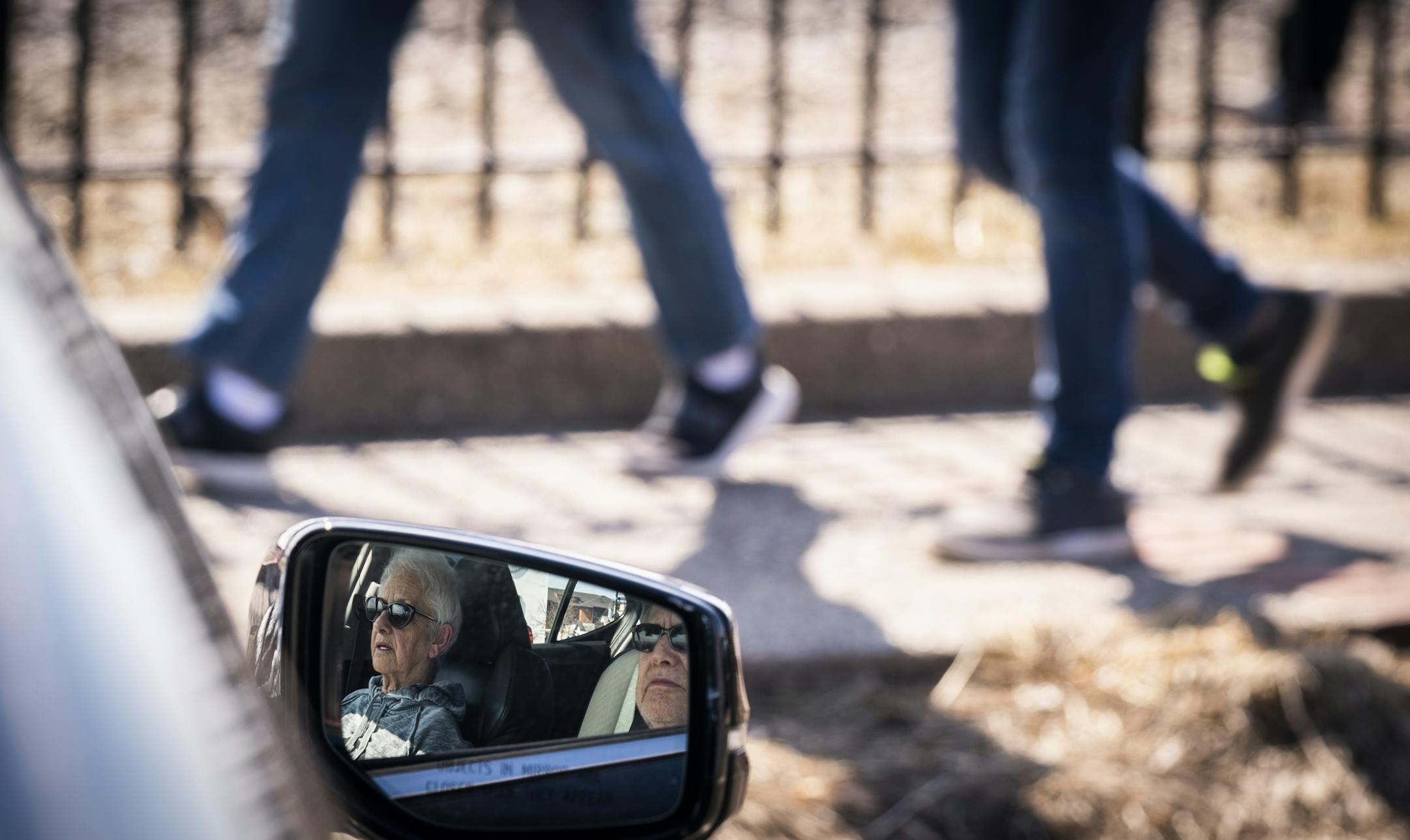 Hinda Litman, 84, and her husband Tom, 85, sat in their car in downtown Wayzata to look at Lake Minnetonka and listen to music.