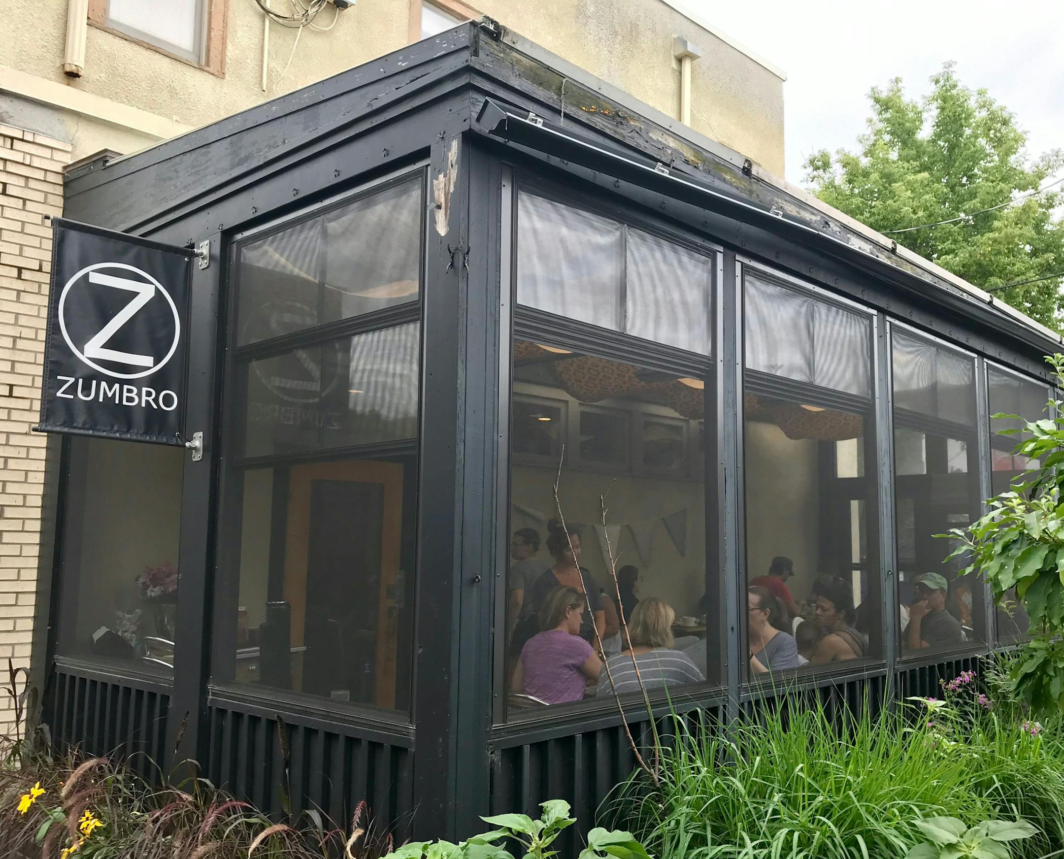 The screen porch at the Zumbro Cafe in Minneapolis.