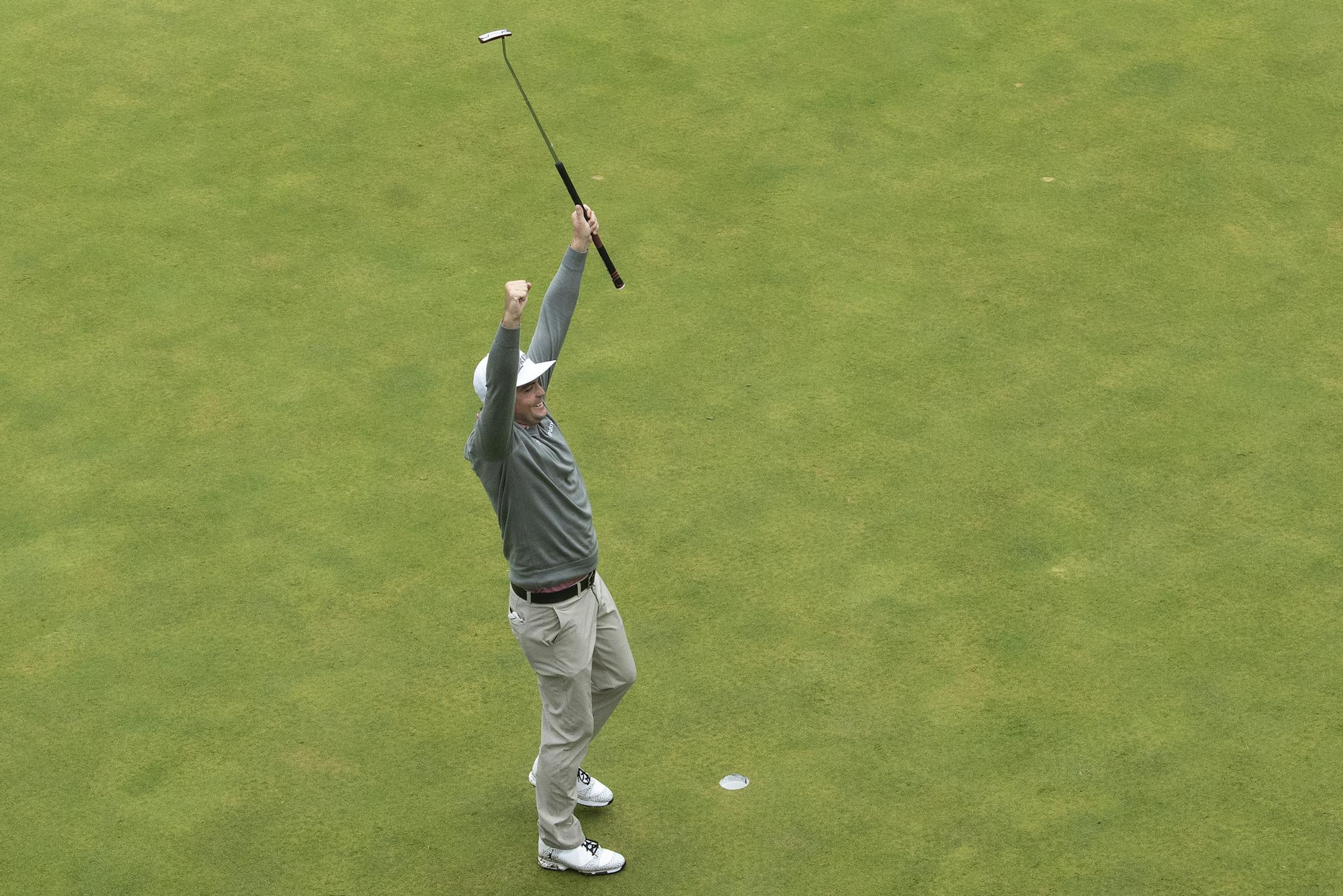 Keegan Bradley raises his hands after winning the BMW Championship golf tournament in Newtown Square, Pa., Monday, Sept. 10, 2018. (Jose Moreno/The Philadelphia Inquirer via AP)