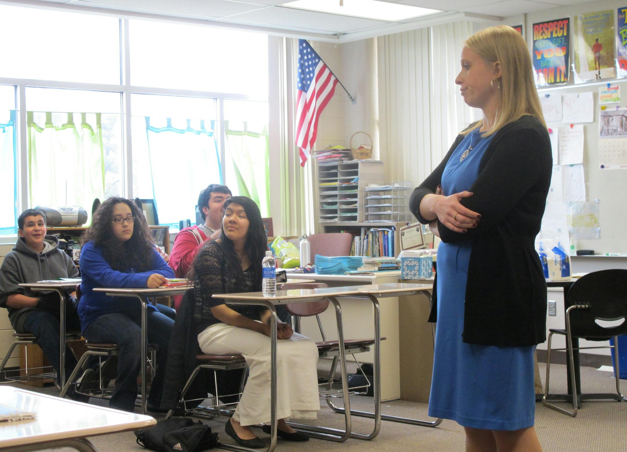 Photo by Erin Adler. Teacher Amanda Marek at West Junior High in Shakopee talks with her Spanish for Native Speakers class.