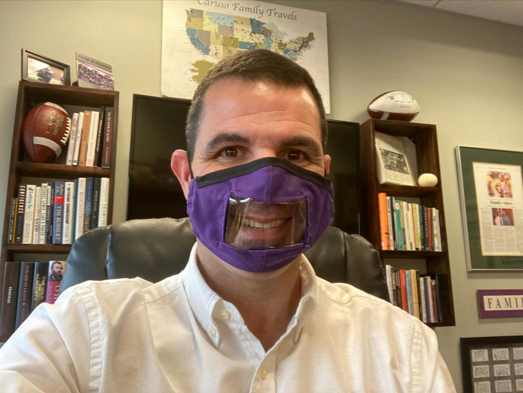 Glenn Caruso in mask designed by a St. Thomas player early in COVID.