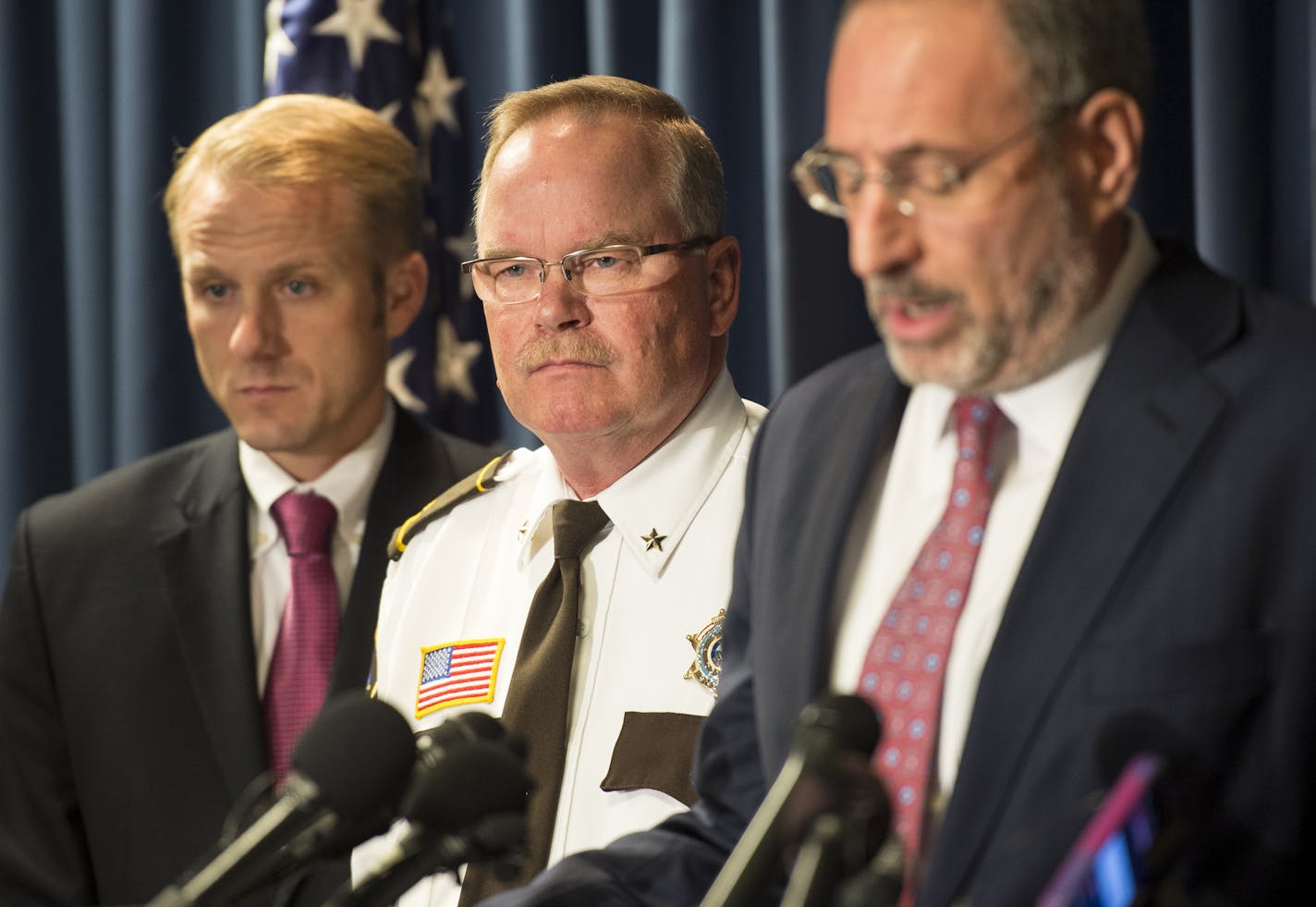 Stearns County Sheriff John Sanner, center, looked on as United States Attorney Andrew Luger addressed the media concerning the naming of a possible suspect in the 1989 disappearance of Jacob Wetterling Thursday afternoon. ] (AARON LAVINSKY/STAR TRIBUNE) aaron.lavinsky@startribune.com A press conference concerning the 1989 disappearance of Jacob Wetterling was held at the Federal Courthouse in Minneapolis, Minn. on Thursday, Oct. 29, 2015. Daniel James Heinrich, 52, of Stearns County, was named