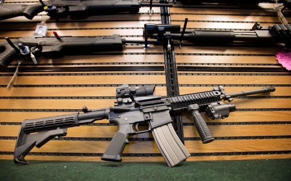 The Colt AR-15 semi-automatic rifle on display at Joe's Sporting Goods in St. Paul in 2012.