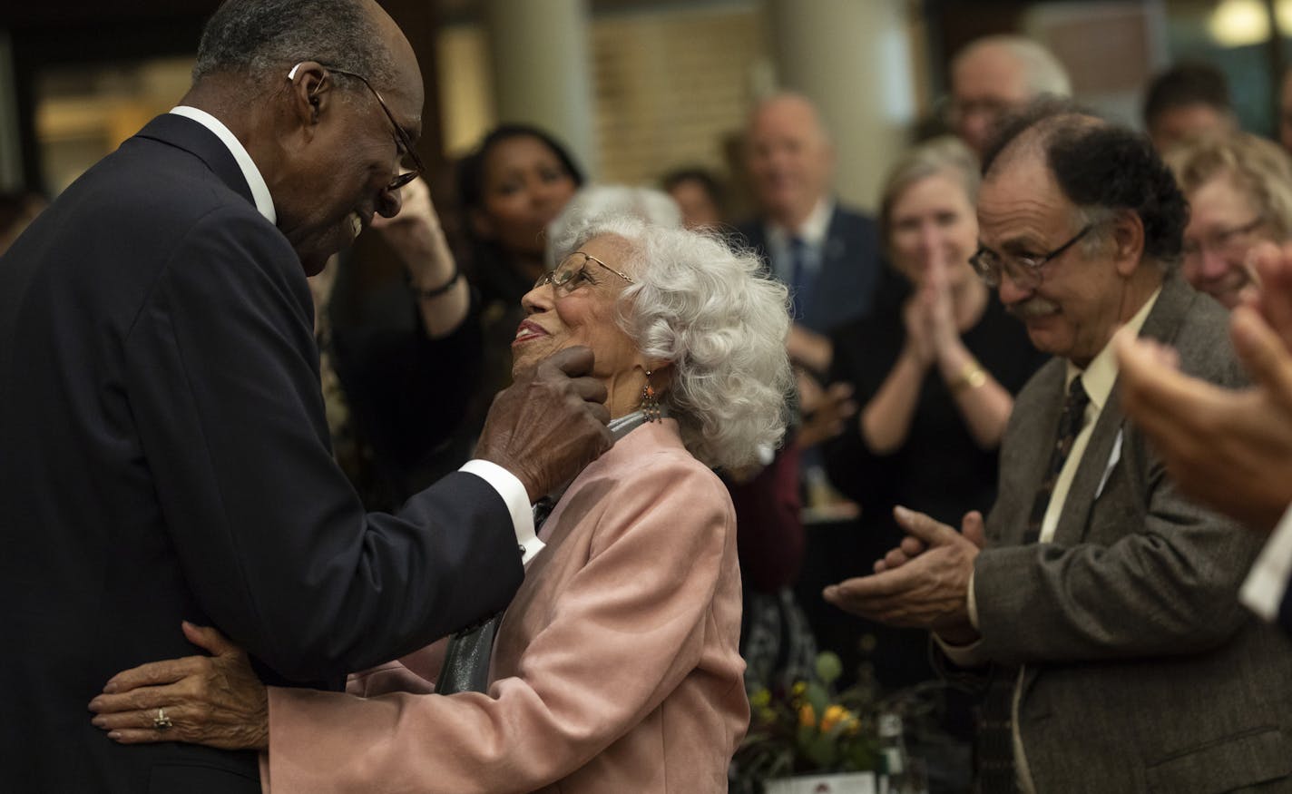 Civil rights activist Vernon Jordan gave Dr. Josie Robinson Johnson a friendly pinch on her cheek after she hugged him thanking him for speaking about her at a ceremony to establish the Josie Robinson Johnson Fellowship and a dedication of a community room in her name at the University of Minnesota Humphrey School of Public Affairs in Minneapolis, Minn., on Monday, October 15, 2018. ] RENEE JONES SCHNEIDER &#x2022; renee.jones@startribune.com