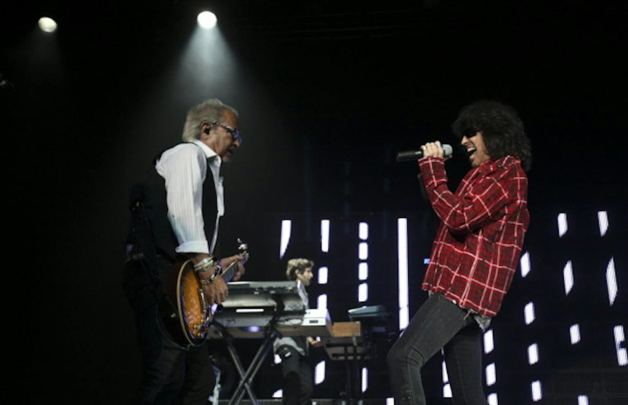Mick Jones, left, stood out front with Foreigner's stand-in singer Kelly Hansen at Xcel Energy Center on Thursday. / Photos by Kyndell Harkness