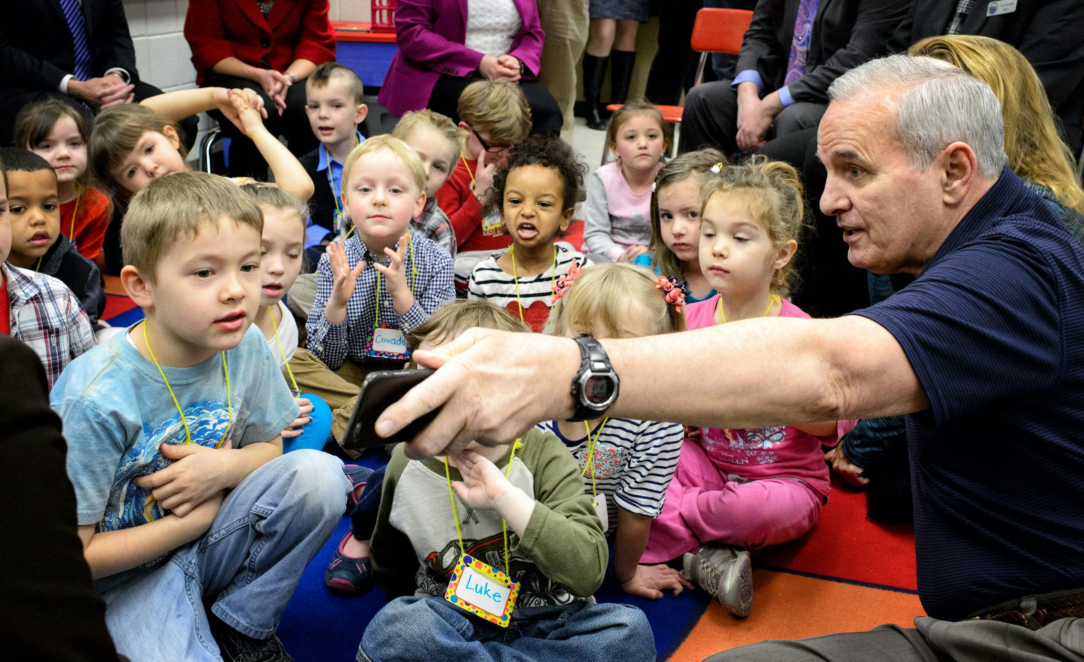 Governor Dayton showed the Pre K class photos of his dogs chewing on the frisbees he threw to them.