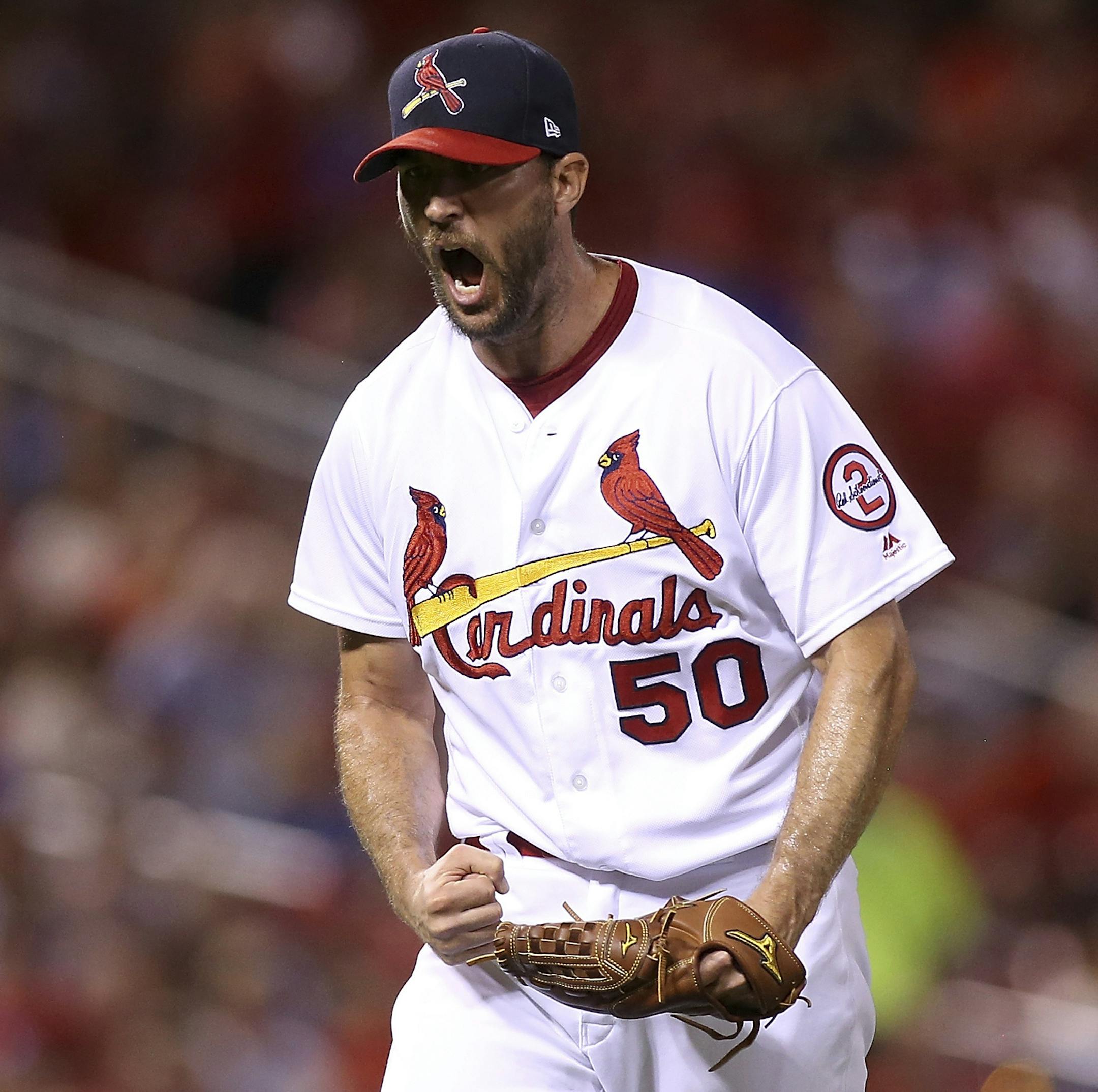 St. Louis Cardinals starting pitcher Adam Wainwright (50) reacts after striking out Los Angeles Dodgers' Joc Pederson to end the top of the fifth inning of a baseball game Sunday, Sept. 16, 2018 in St. Louis. (AP Photo/Scott Kane)