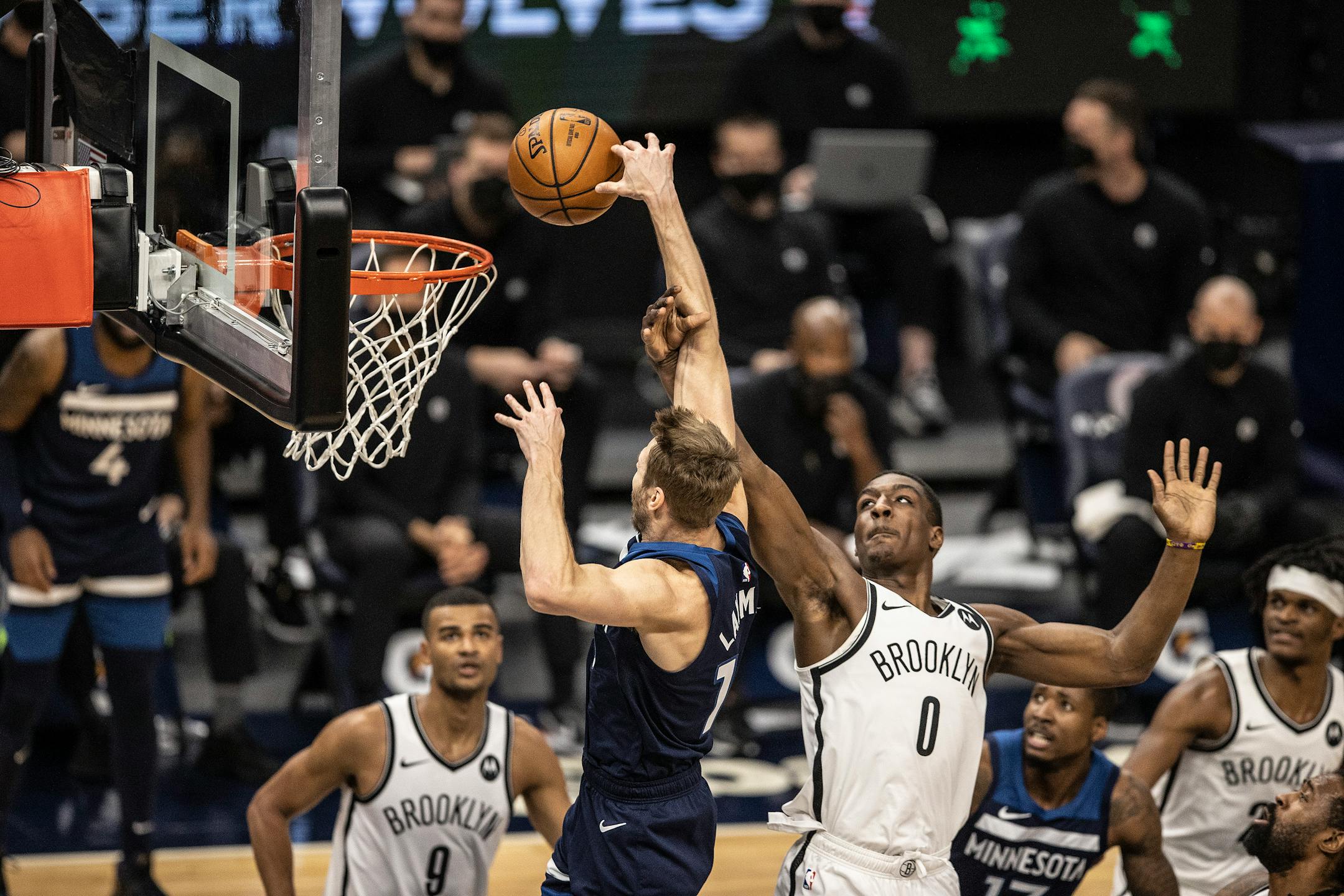 Minnesota Timberwolves forward Jake Layman (10) was fouled by Brooklyn Nets forward Reggie Perry (0) at Target Center April 13, 2021 in Minneapolis.