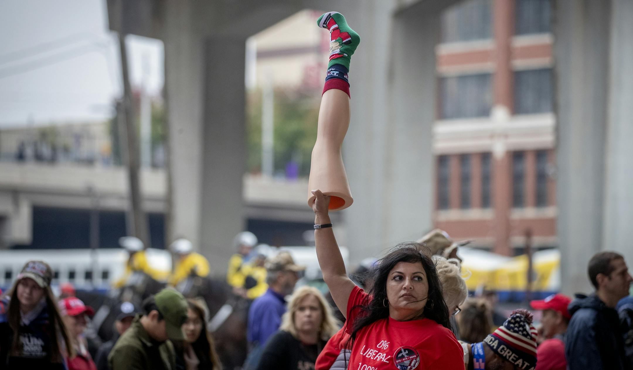 Many took advantage of the crowds to sell political merchandise for Trump supporters as they waited to get into the Target Center from 5th Street North, for President Trump's visit, Thursday, October 10, 2019 in Minneapolis, MN.