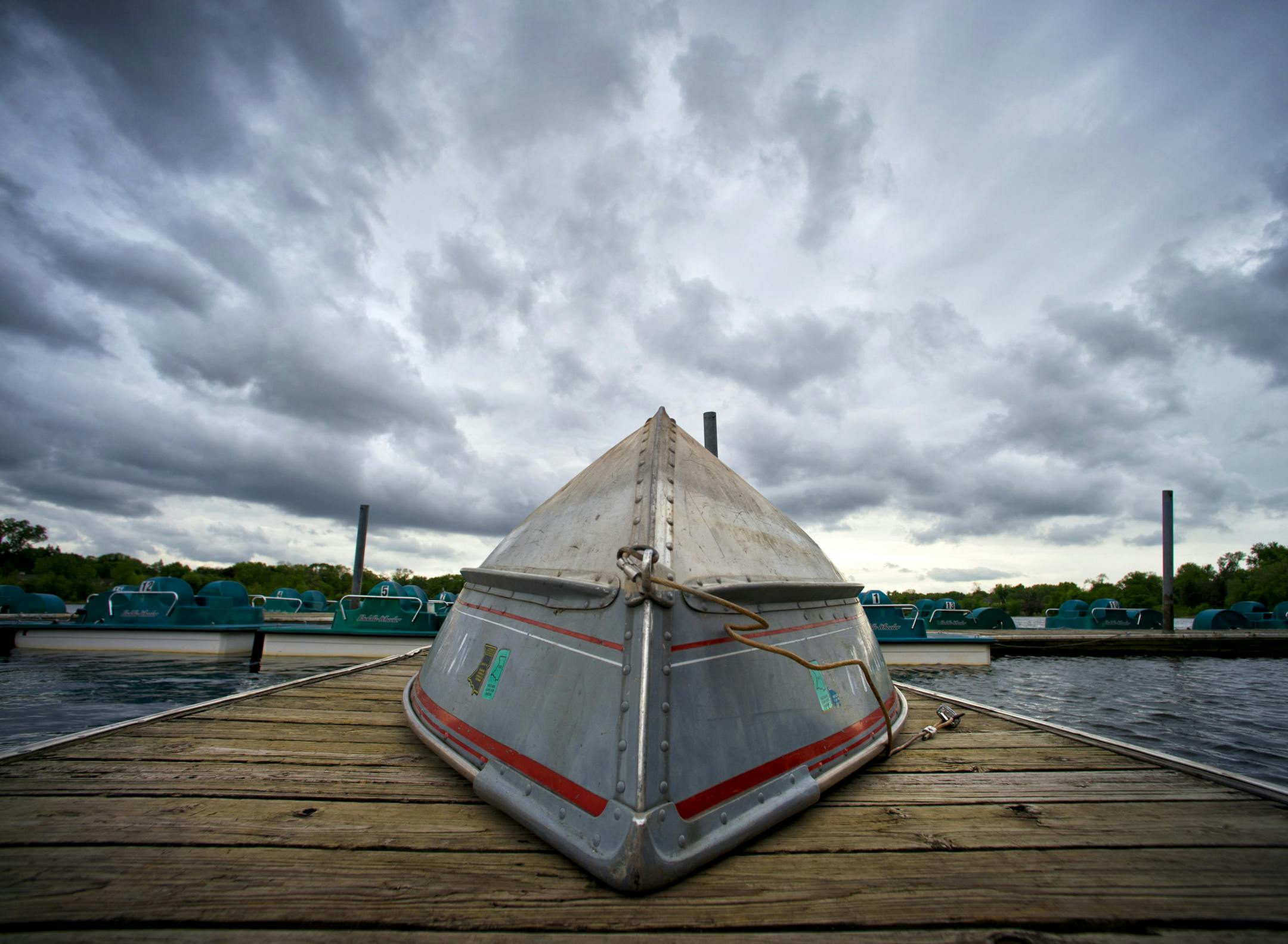 Boats and paddleboats on the dock at Lake Como in St. Paul. This May has been one of the gloomiest on record. Thursday, May 30, 2013 ] GLEN STUBBE * gstubbe@startribune.com