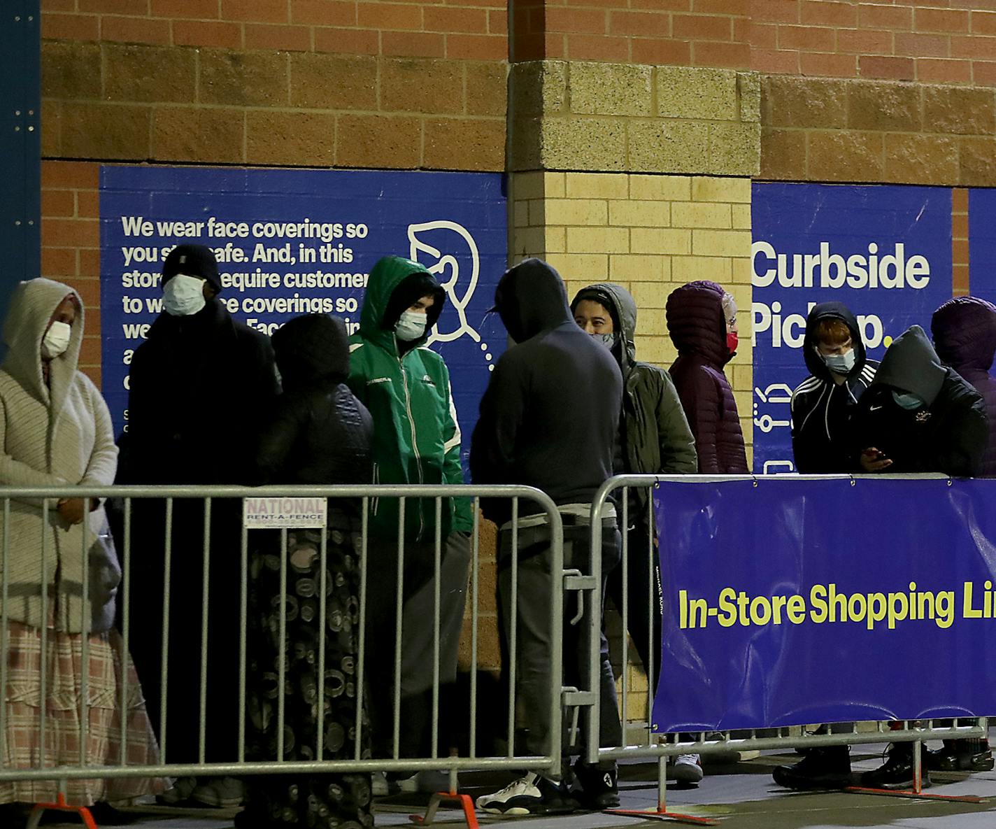 Clockwise from top left, people lined up outside the Richfield Best Buy for the 5 a.m. Black Friday opening; shoppers at the Mall of America; a shopper with a full cart at Walmart in Bloomington; a Nordstrom Rack sales associate.