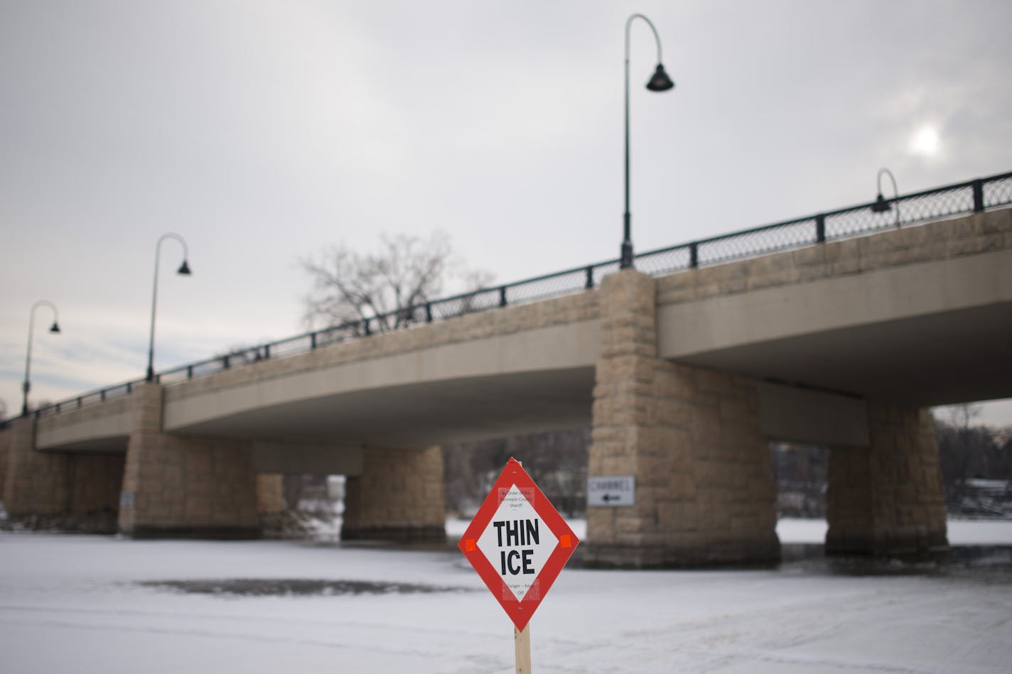 A thin ice sign marks the area under the bridge separating Gray's Bay and Wayzata Bay. ] (Aaron Lavinsky | StarTribune) Over the course of a particularly Minnesotan 24 hours, three vehicles have gone through the ice on Lake Minnetonka. Authorities are warning drivers off of the thin ice, which has become tempting during this week's freeze. We'll be taking a look at how this year compares to other years in terms of ice safety (and accidents), and what draws drivers to make this treacherous trek i