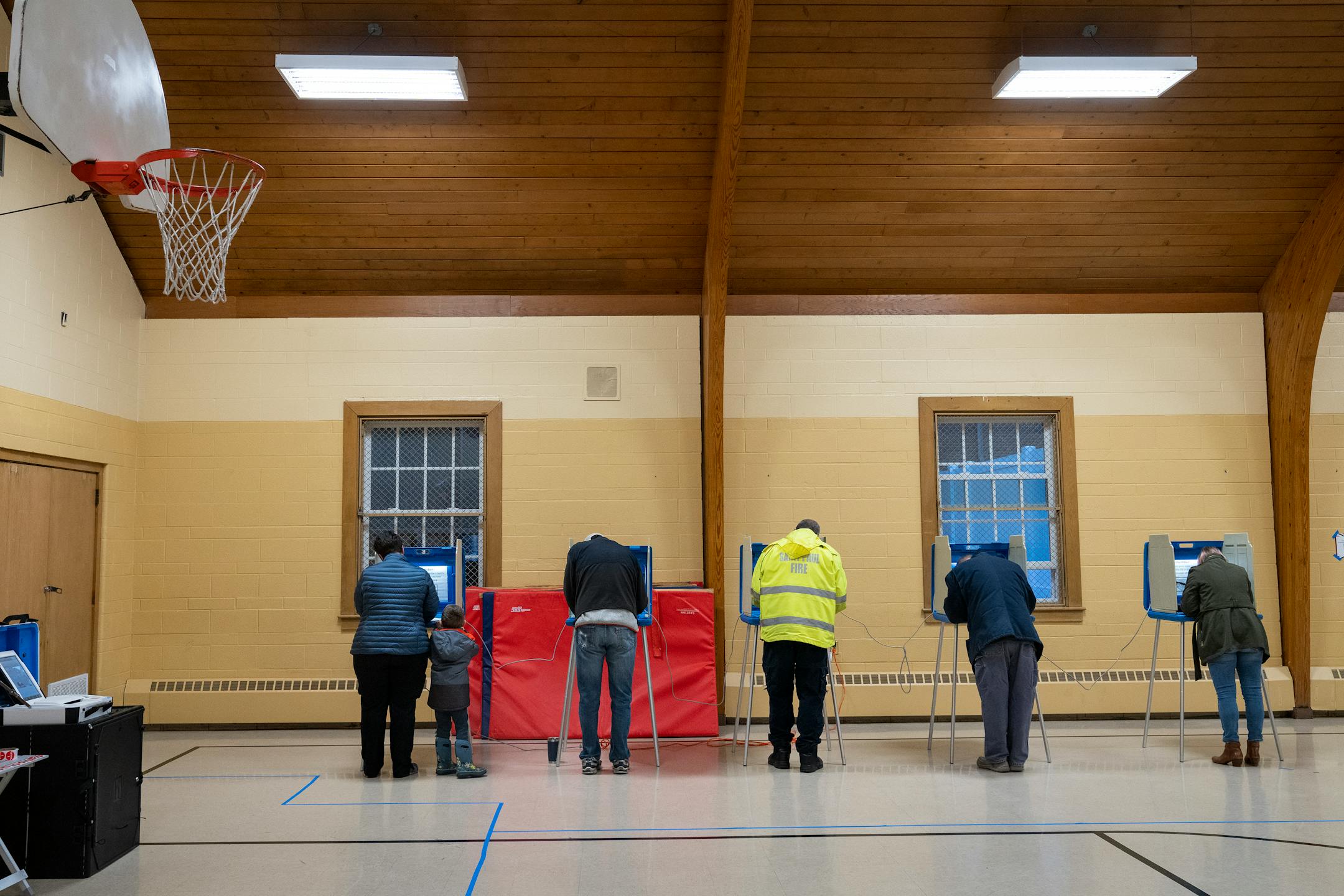 Voters mark their ballots at Gloria Dei Lutheran Church in Ward 3 of St. Paul.