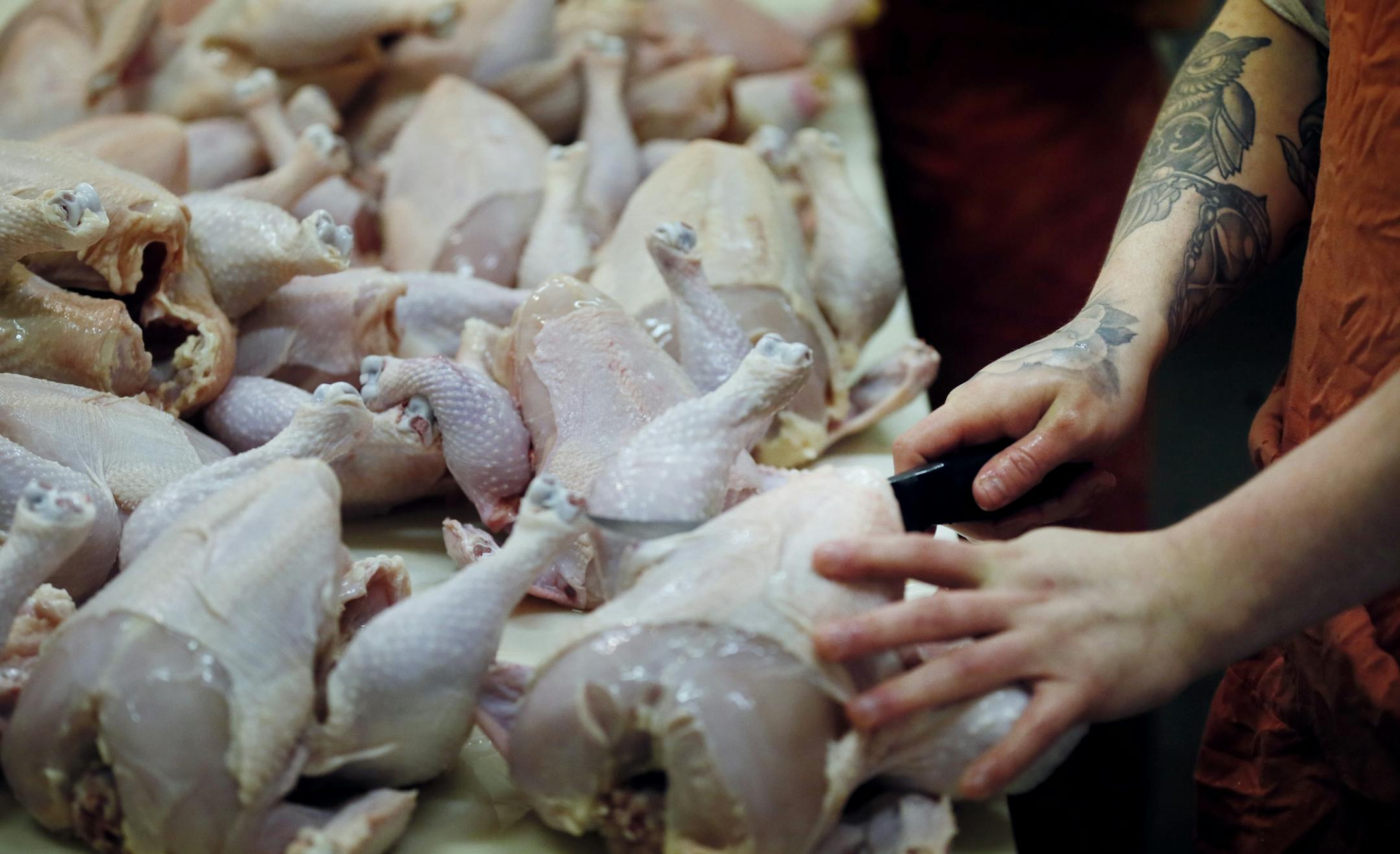 Zach Malich butchered a chicken at the Northeast Regional Corrections Center. A few lawmakers want to turn that loose program into a certification-granting curriculum with the idea that it will help the men get jobs and, more broadly, respond to a shortage of butchers.
