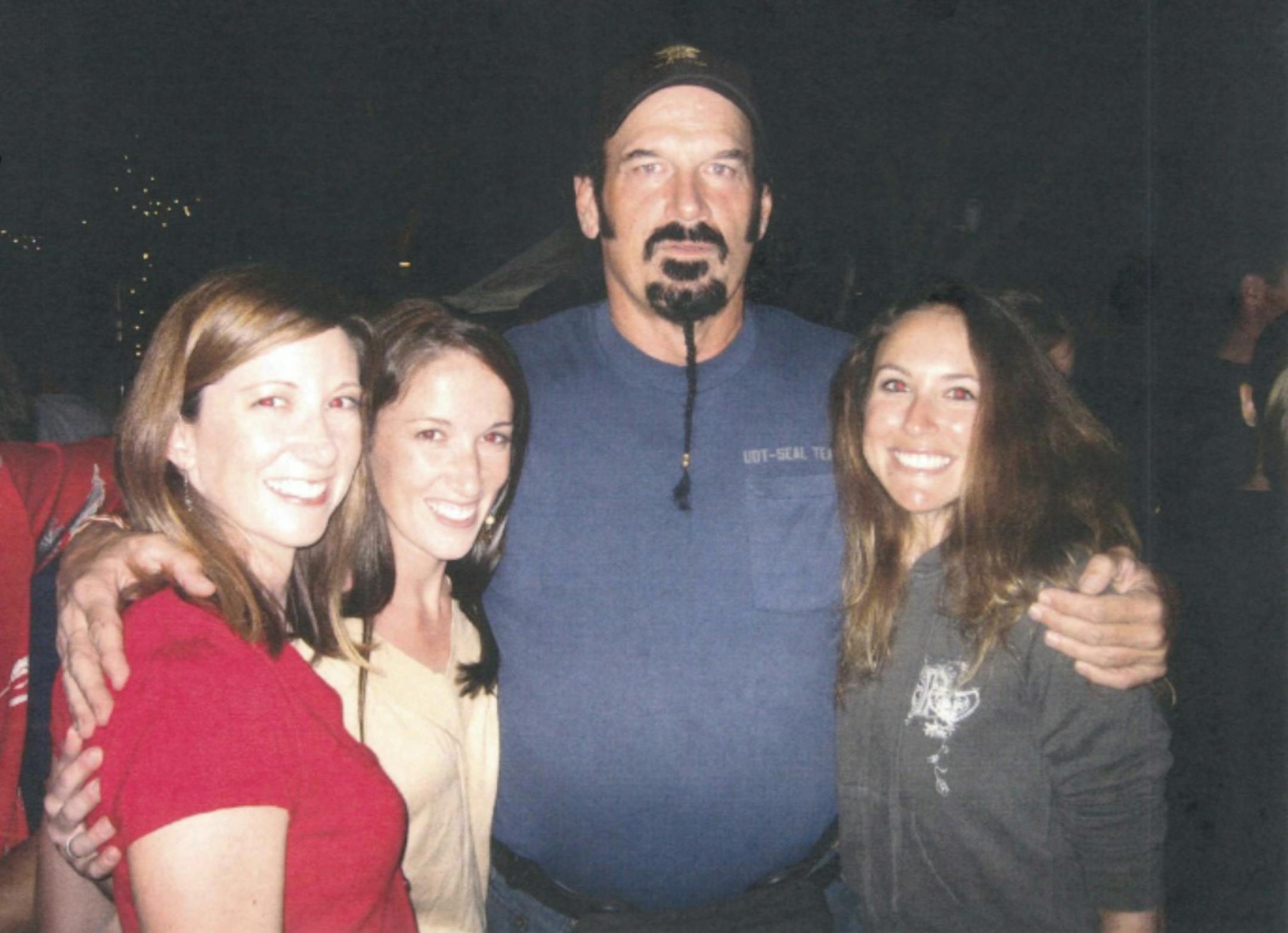 Former Gov. Jesse Ventura pictured at a San Diego bar with Laura and Rosemary deShazo and a friend. Court documents do not specify the order of the women in the photo. Ventura's actions at the bar that night are now the subject of a lawsuit.